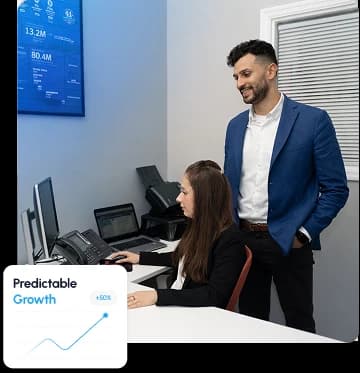 Team collaborating in a modern office with performance insights